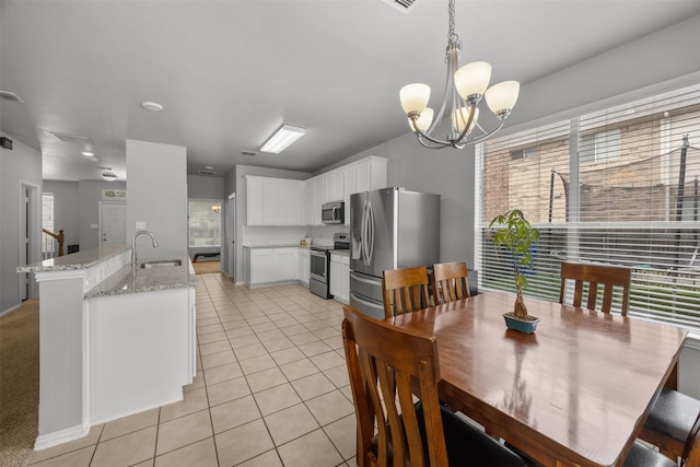 60 Misty Mesa Trl, Mansfield, TX 76063 - dining area with a chandelier and light tile patterned floors