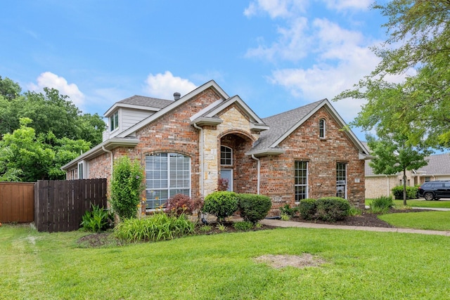 142 Shelby Trce, Murphy, TX 75094 - traditional-style house with brick siding and roof with shingles