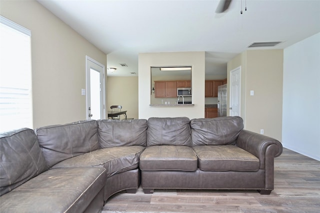 122 Buffalo Ridge Dr, Newark, TX 76071 - living room featuring light wood-style flooring and ceiling fan