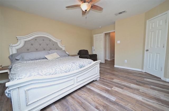 122 Buffalo Ridge Dr, Newark, TX 76071 - bedroom featuring wood finished floors, baseboards, and a ceiling fan