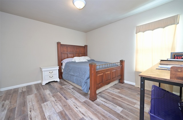 122 Buffalo Ridge Dr, Newark, TX 76071 - bedroom with wood finished floors and baseboards