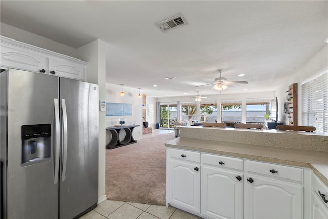 431 Jib Dr, Gun Barrel City, TX 75156 - kitchen with stainless steel refrigerator with ice dispenser, ceiling fan, light carpet, light tile patterned floors, and open floor plan
