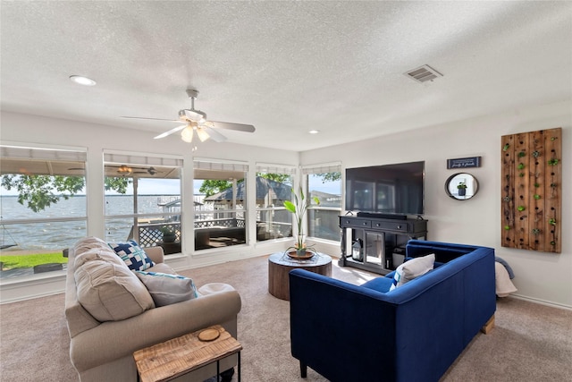 431 Jib Dr, Gun Barrel City, TX 75156 - living room featuring carpet flooring, a textured ceiling, a ceiling fan, recessed lighting, and baseboards