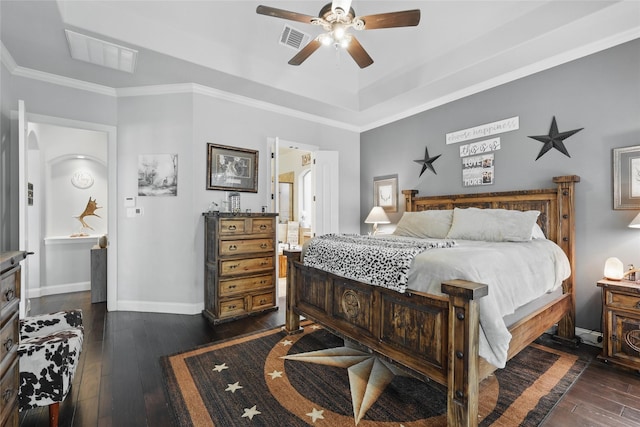 1447 Cimarron Trl, Hurst, TX 76053 - bedroom featuring dark wood-style flooring, baseboards, ornamental molding, ceiling fan, and a raised ceiling