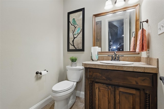 1447 Cimarron Trl, Hurst, TX 76053 - half bathroom with toilet, vanity, tile patterned floors, and baseboards
