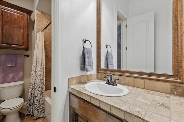 1447 Cimarron Trl, Hurst, TX 76053 - bathroom featuring toilet, vanity, and shower / bath combination with curtain
