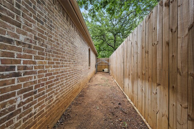 1447 Cimarron Trl, Hurst, TX 76053 - view of home's exterior with brick siding