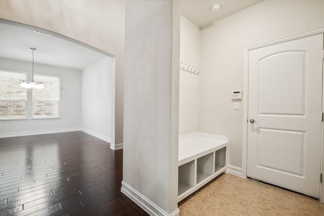 2341 Leeward Pl, Little Elm, TX 75068 - mudroom featuring baseboards, a chandelier, and wood finished floors