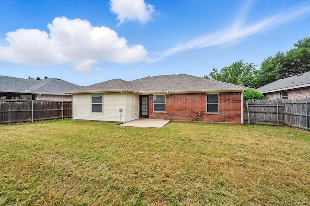 1412 Mockingbird Ln, Desoto, TX 75115 - back of property with a patio and brick siding