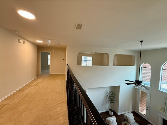 4561 Firewheel Dr, Plano, TX 75024 - hall with attic access, light colored carpet, and baseboards