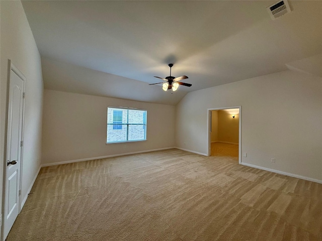 4561 Firewheel Dr, Plano, TX 75024 - unfurnished bedroom with light carpet, lofted ceiling, baseboards, and ceiling fan