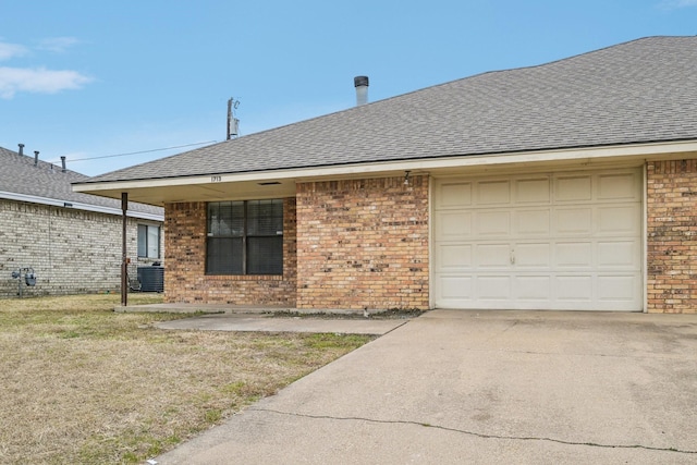 1713 Carrington, Glenn Heights, TX 75154 - view of front of house featuring brick siding, roof with shingles, a garage, concrete driveway, and cooling unit