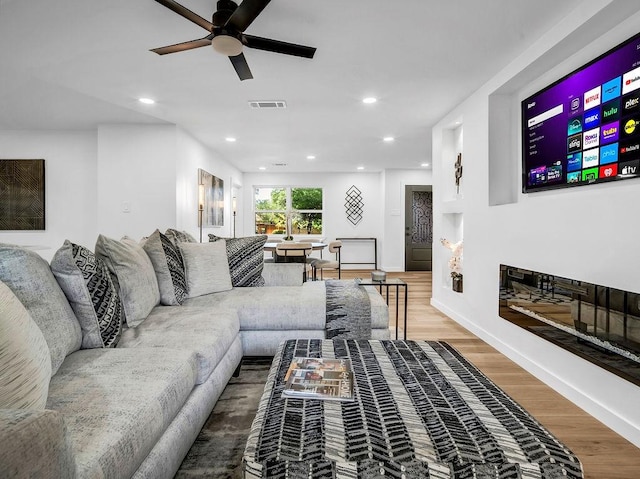 2371 Chart Dr, Dallas, TX 75228 - living room featuring ceiling fan, wood finished floors, baseboards, and recessed lighting