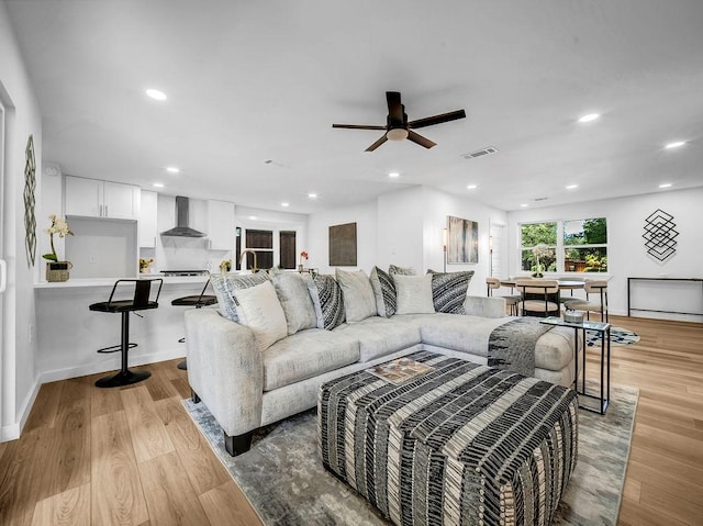2371 Chart Dr, Dallas, TX 75228 - living room featuring light wood-style floors, a ceiling fan, and recessed lighting