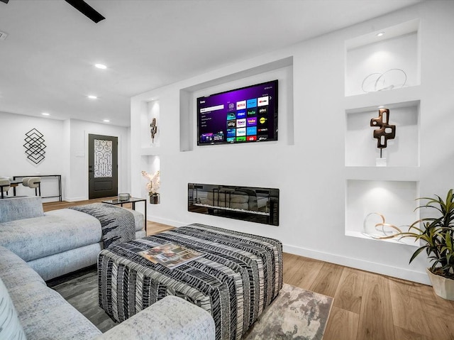 2371 Chart Dr, Dallas, TX 75228 - living area with wood finished floors, recessed lighting, and baseboards