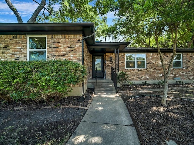 2371 Chart Dr, Dallas, TX 75228 - doorway to property featuring brick siding