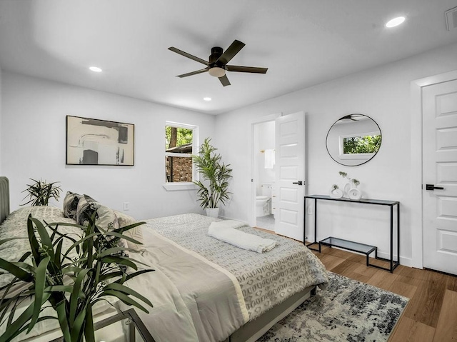 2371 Chart Dr, Dallas, TX 75228 - bedroom with recessed lighting, wood finished floors, connected bathroom, and ceiling fan