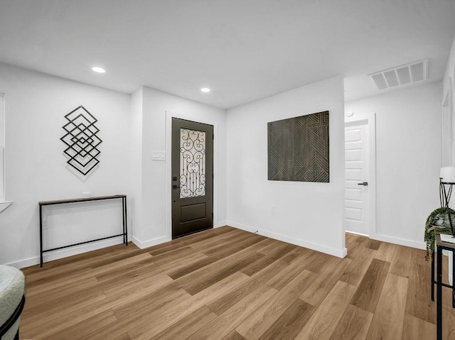 2371 Chart Dr, Dallas, TX 75228 - foyer featuring light wood-style flooring, recessed lighting, and baseboards