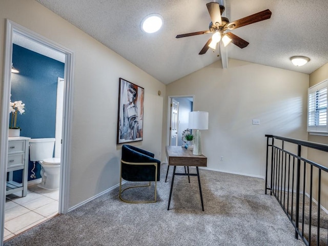 46 Morrow Dr, Bedford, TX 76021 - office area featuring a ceiling fan, carpet floors, vaulted ceiling, a textured ceiling, and baseboards