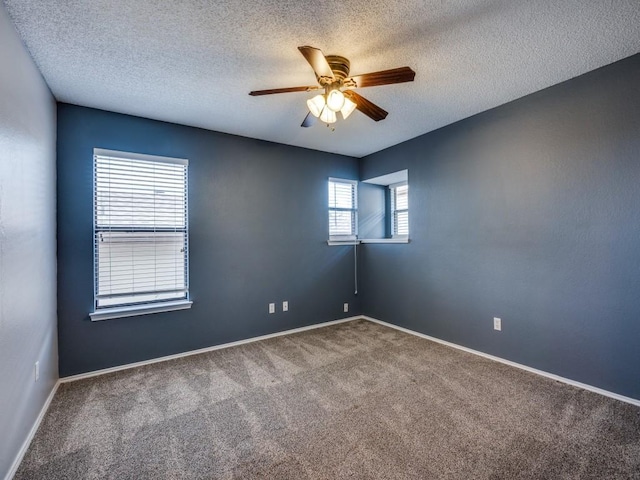 46 Morrow Dr, Bedford, TX 76021 - empty room with carpet, a ceiling fan, a textured ceiling, and baseboards