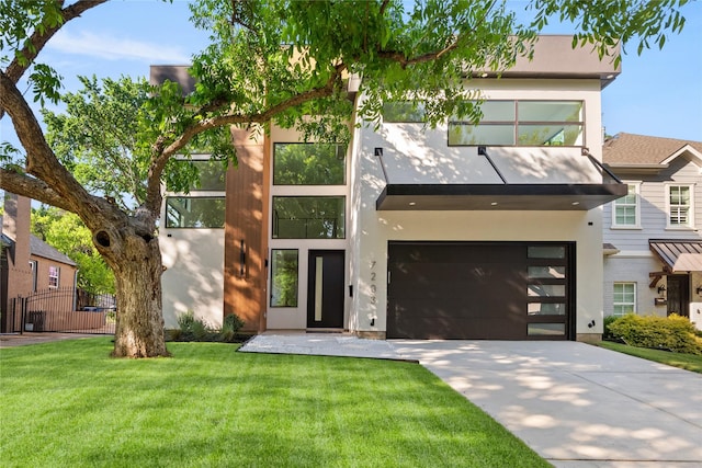 7203 Casa Loma Ave, Dallas, TX 75214 - contemporary home with concrete driveway, stucco siding, and an attached garage
