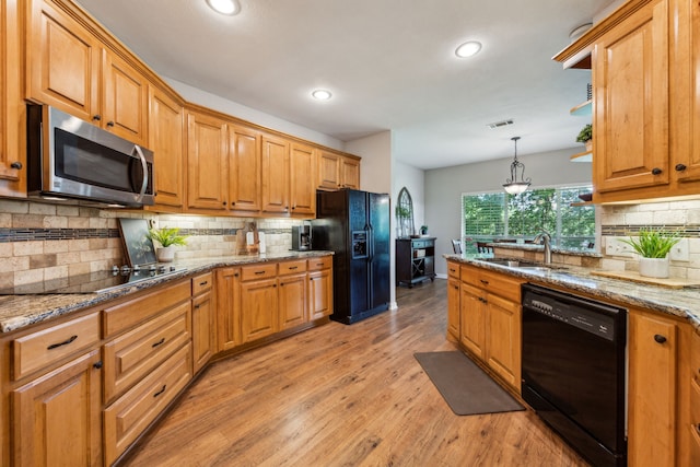 7968 Fm 121, Van Alstyne, TX 75495 - kitchen with black appliances, a sink, backsplash, light wood-style floors, and recessed lighting