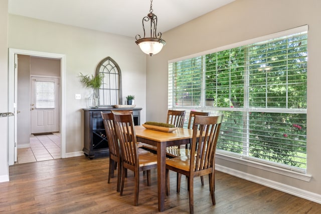 7968 Fm 121, Van Alstyne, TX 75495 - dining room featuring baseboards and wood finished floors