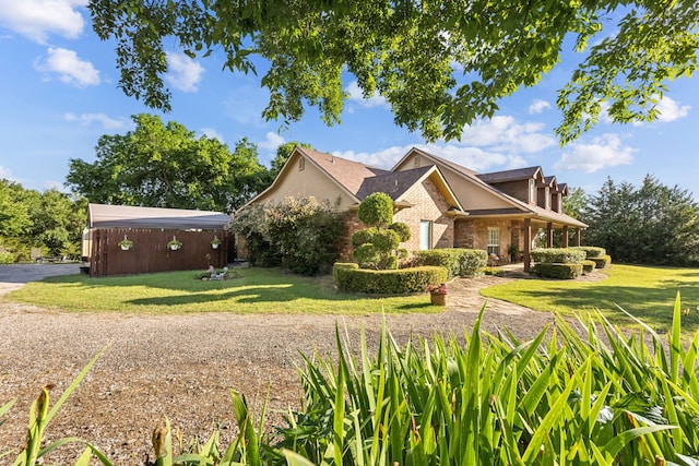 7968 Fm 121, Van Alstyne, TX 75495 - view of front facade with a front lawn and brick siding