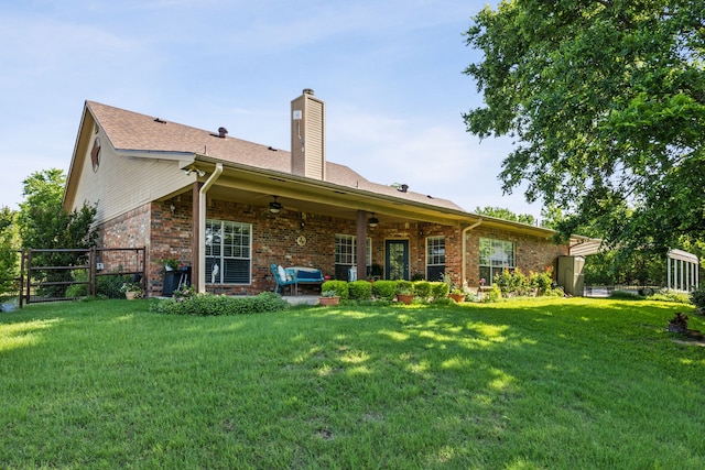 7968 Fm 121, Van Alstyne, TX 75495 - rear view of house featuring ceiling fan, brick siding, a chimney, and a patio area