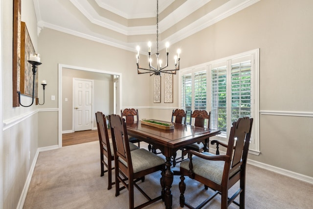 7968 Fm 121, Van Alstyne, TX 75495 - carpeted dining space with a chandelier, crown molding, a tray ceiling, and baseboards