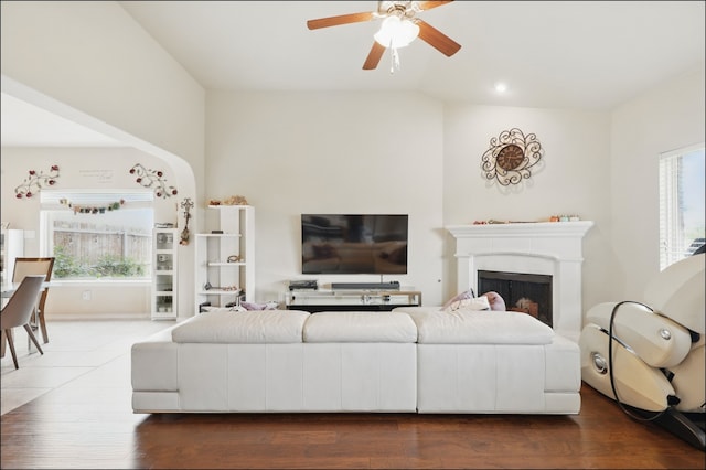 31 Oakridge Ln, Edgecliff Village, TX 76134 - living area with healthy amount of natural light, a ceiling fan, wood finished floors, a fireplace, and lofted ceiling
