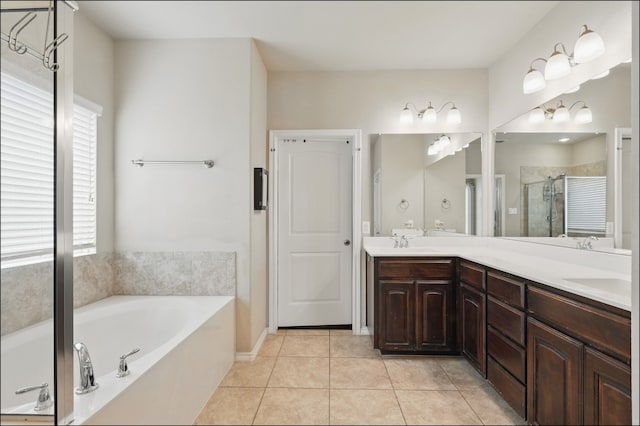 31 Oakridge Ln, Edgecliff Village, TX 76134 - full bath with a bath, a stall shower, double vanity, and tile patterned flooring
