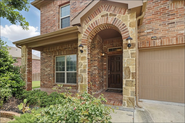 31 Oakridge Ln, Edgecliff Village, TX 76134 - doorway to property featuring brick siding and stone siding