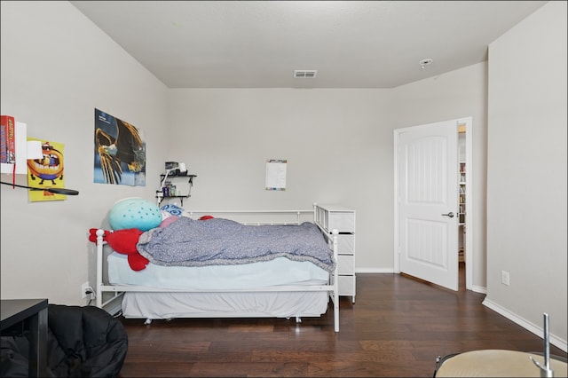 31 Oakridge Ln, Edgecliff Village, TX 76134 - bedroom featuring wood finished floors and baseboards
