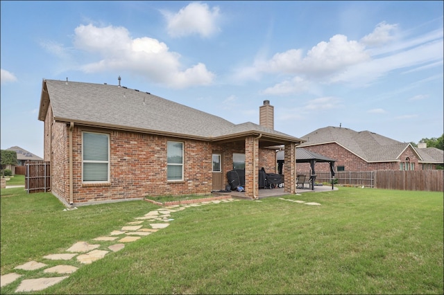 31 Oakridge Ln, Edgecliff Village, TX 76134 - back of house featuring a gazebo, a chimney, a patio area, and brick siding