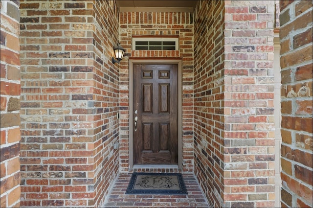 31 Oakridge Ln, Edgecliff Village, TX 76134 - view of exterior entry with brick siding
