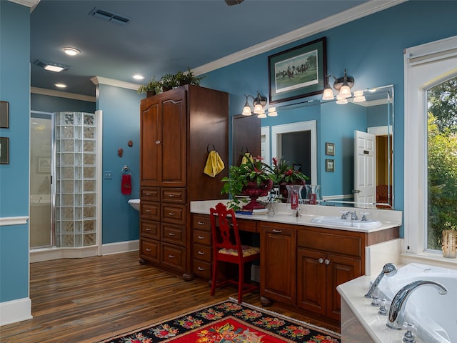 12090 W Fm 346, Bullard, TX 75757 - full bathroom featuring ornamental molding, a shower stall, double vanity, wood finished floors, and a garden tub