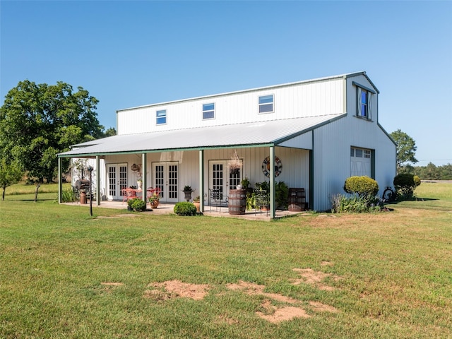 12090 W Fm 346, Bullard, TX 75757 - rear view of house with french doors, a lawn, and metal roof