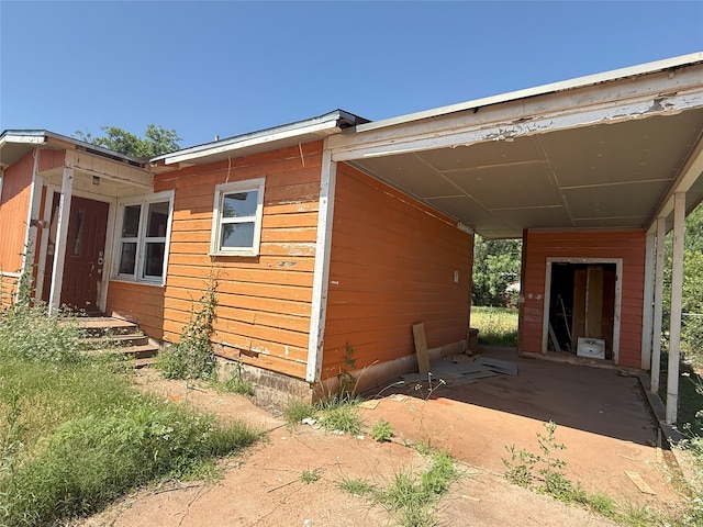2458 N Mockingbird Ln, Abilene, TX 79603 - view of side of home featuring a carport
