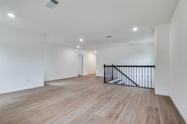 2723 Bentley Ave, Dallas, TX 75211 - empty room with light wood-style floors, recessed lighting, and baseboards