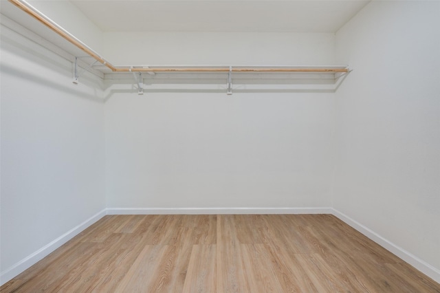 2723 Bentley Ave, Dallas, TX 75211 - spacious closet featuring wood finished floors