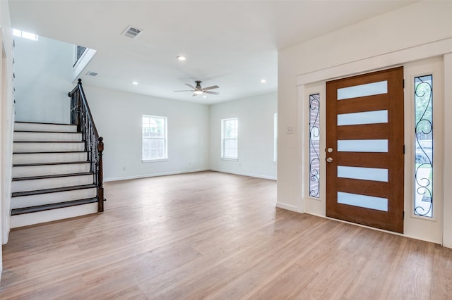 2723 Bentley Ave, Dallas, TX 75211 - entrance foyer with light wood-type flooring, stairway, ceiling fan, recessed lighting, and baseboards