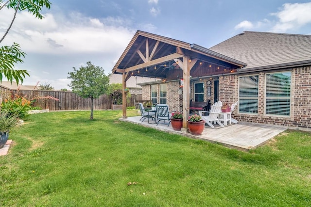 324 Jefferson Ln, Fate, TX 75189 - back of house with brick siding, a patio area, and a shingled roof