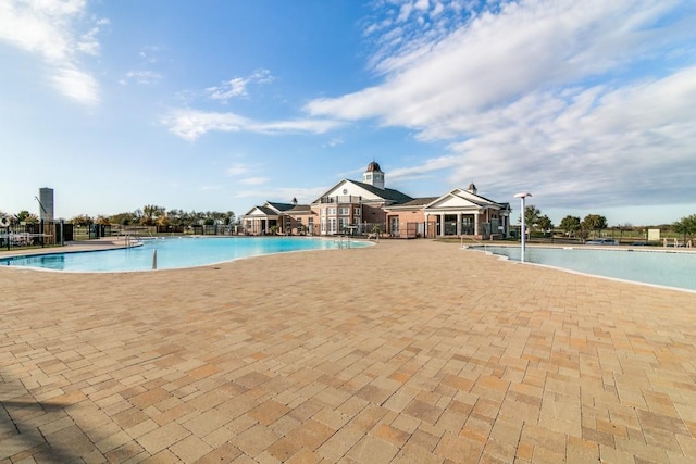 324 Jefferson Ln, Fate, TX 75189 - community pool featuring a patio area