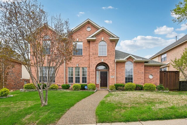 604 Nelson Ct, Plano, TX 75025 - traditional-style house featuring brick siding and roof with shingles