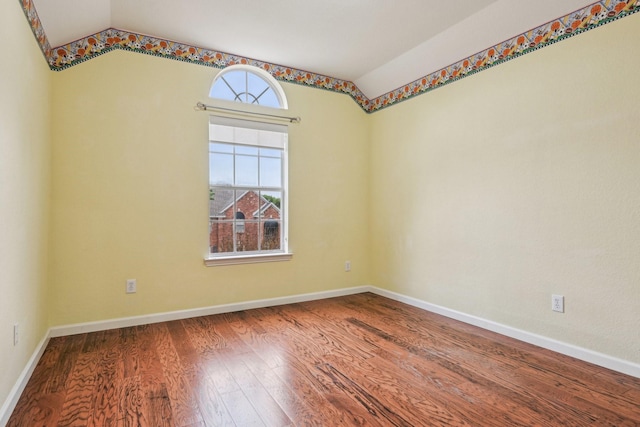 604 Nelson Ct, Plano, TX 75025 - empty room featuring lofted ceiling, wood finished floors, and baseboards