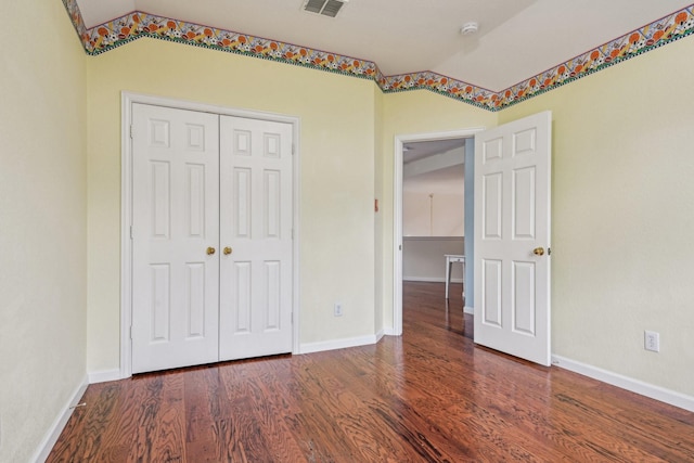 604 Nelson Ct, Plano, TX 75025 - unfurnished bedroom featuring wood finished floors, a closet, baseboards, and lofted ceiling