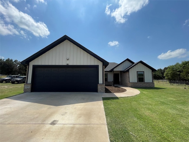 108 Ronnie Ln, Weatherford, TX 76088 - view of front of property with a front yard, board and batten siding, an attached garage, and brick siding