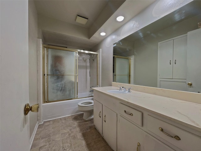 3614 Matador Dr, Garland, TX 75042 - bathroom featuring vanity, toilet, combined bath / shower with glass door, baseboards, and recessed lighting