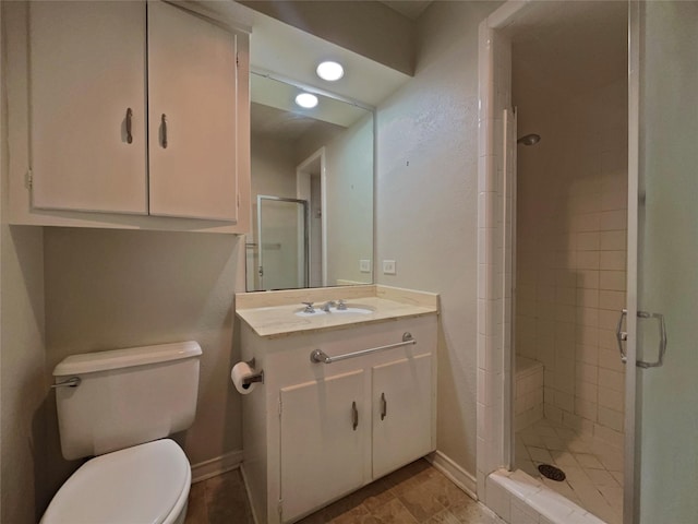 3614 Matador Dr, Garland, TX 75042 - full bath with a stall shower, vanity, toilet, and baseboards